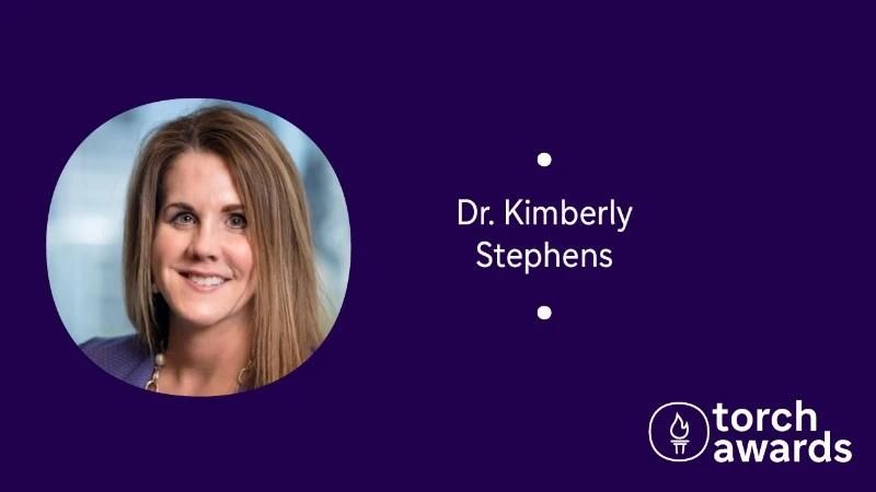 headshot of Dr. Kimberly Stephens on a variegated purple background and the torch awards logo in the lower right corner.