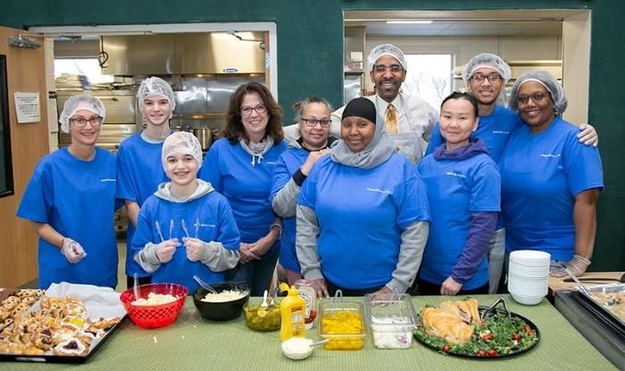 Phillip St. James along with 9 other Sanofi employees and their family members volunteer at the Salvation Army soup kitchen.