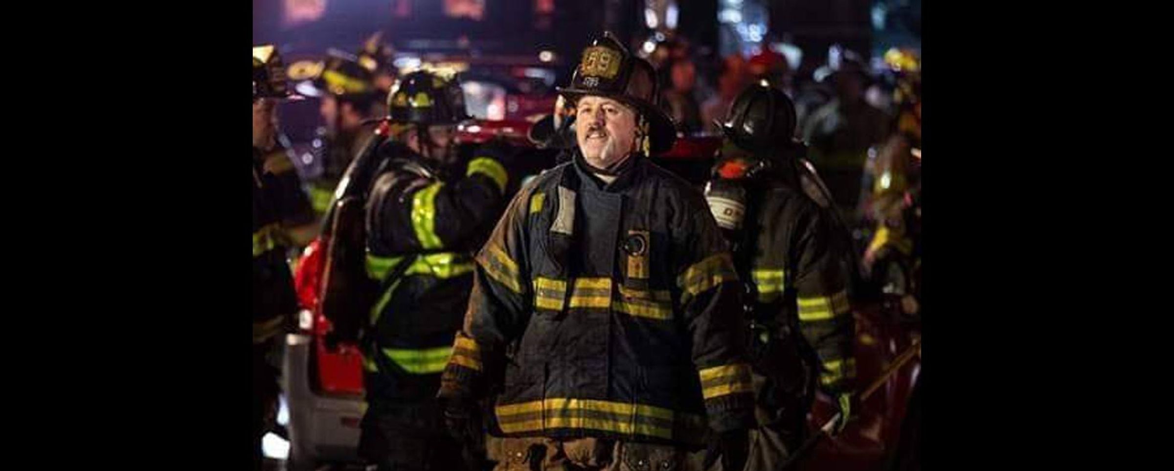 Jim Kuzmack wearing his fireman's uniform while out on a call.