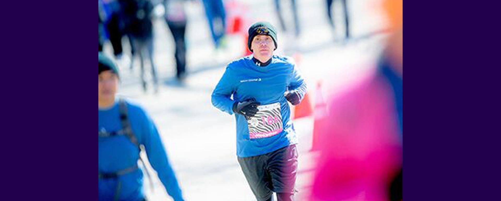 Daniel Buckelew running in a race.