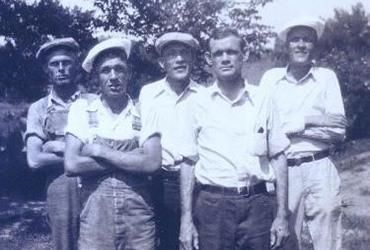 Jack Johnson's maternal grandfather stands with his four brothers in a line in a black and white photo from 1938.